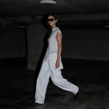 Women in white outfit shop the best sellers online shopping cloth lifestyle