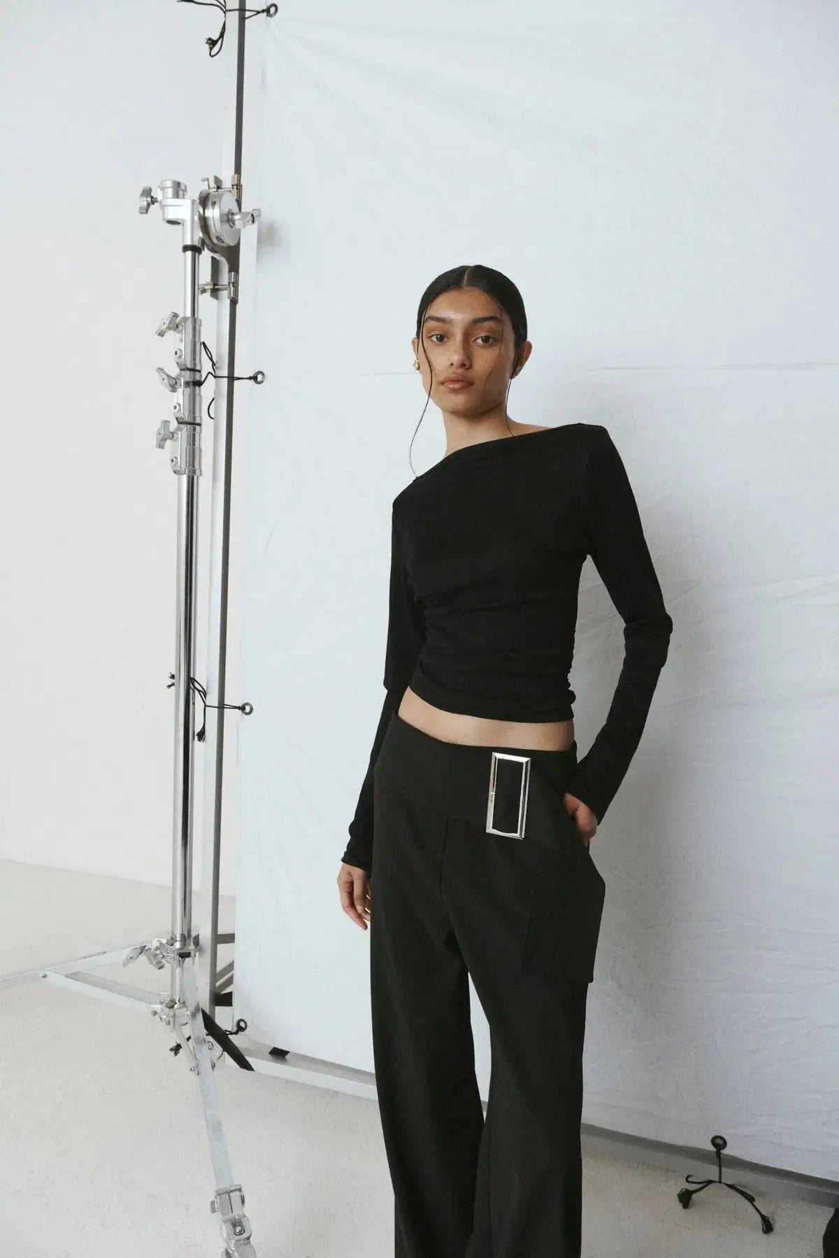 Black long sleeve top by One of others at clothlifestyle