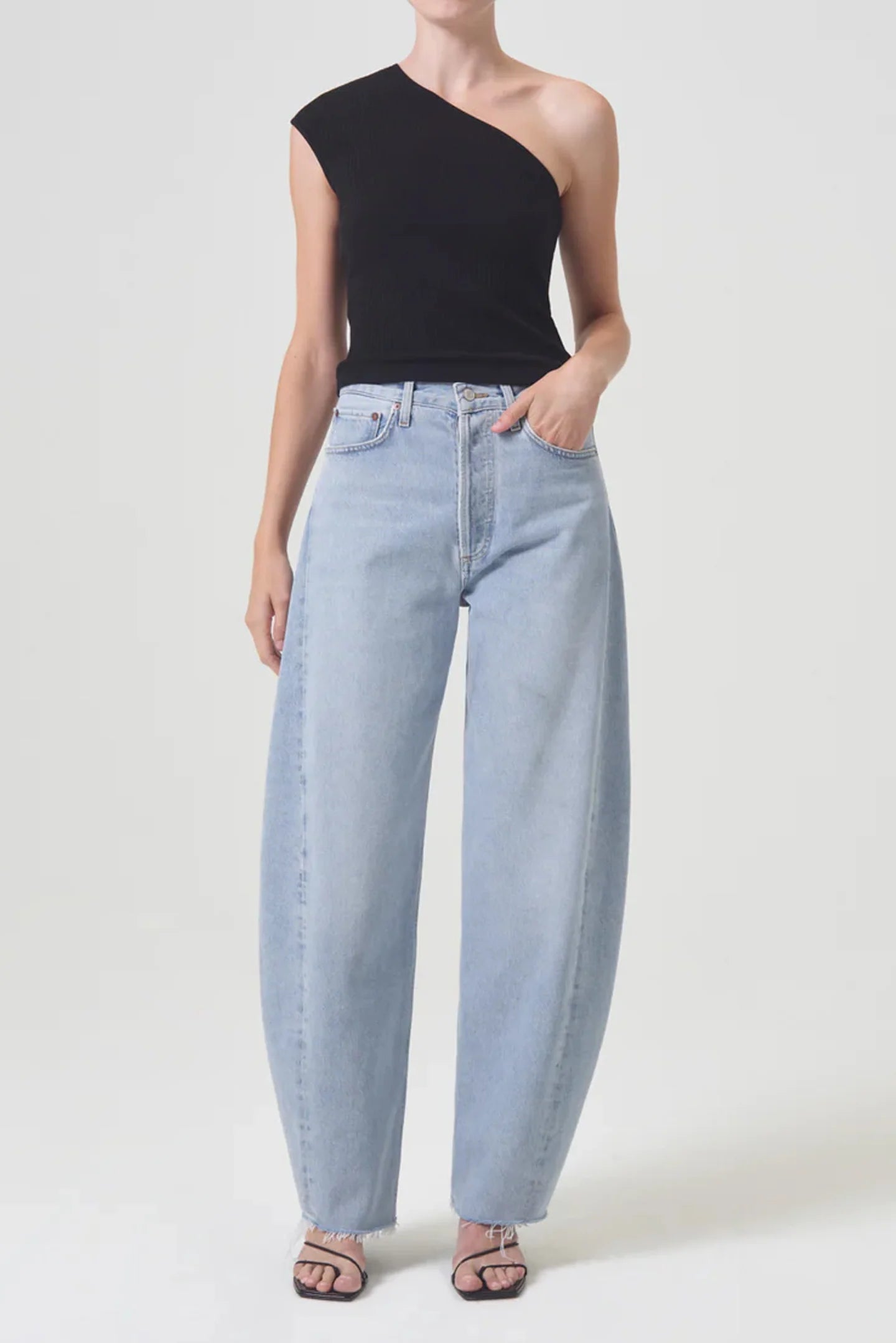 Agolde Barrel leg jean in light blue denim at Clothlifestyle Boutique