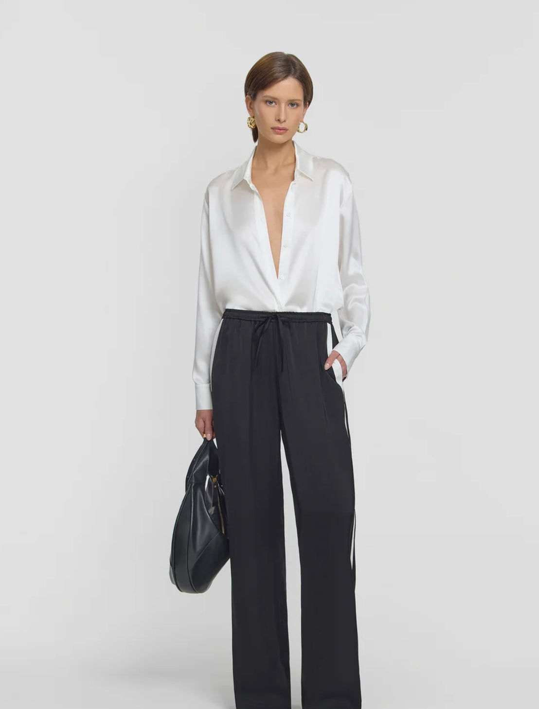 Black pant with white stripe by elka collective at clothlifestyle boutique