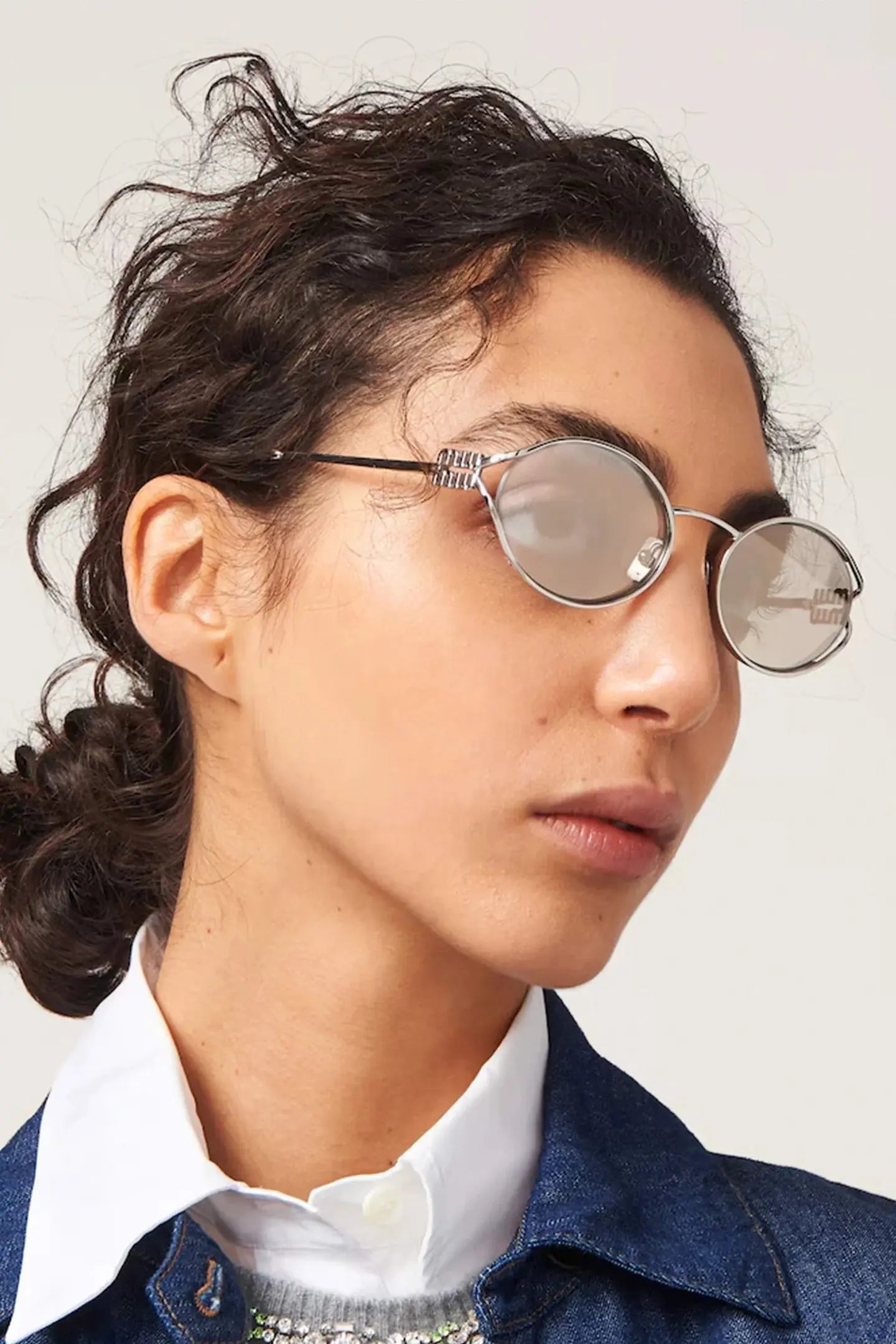 Logo Metal Oval Sunglasses by Miu Miu Miu Miu
