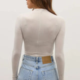 Amrita Bodysuit in Baby