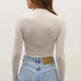 Amrita Bodysuit in Baby