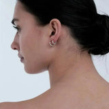 Huggie earrings gun