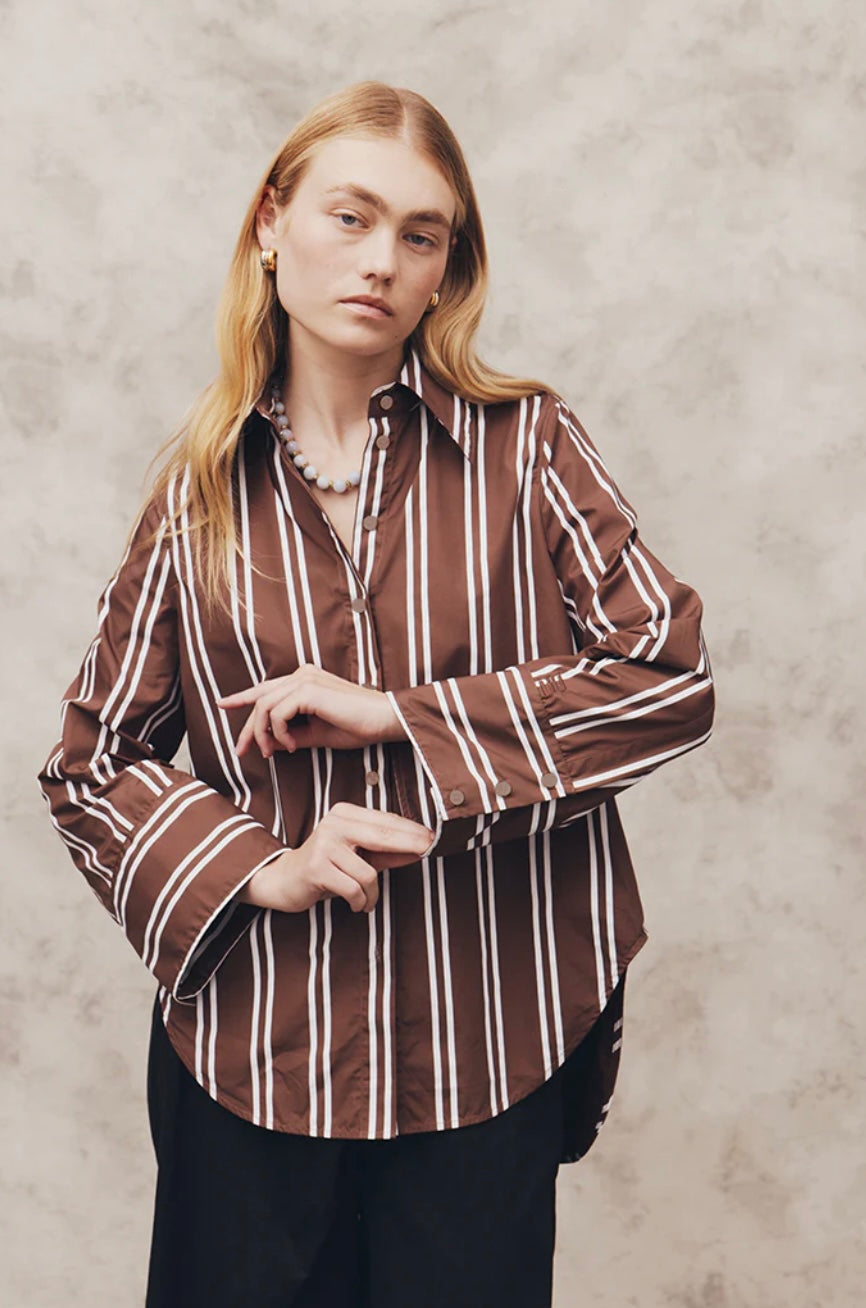 BLANCA at Cloth Lifestyle a premium Australian women’s fashion label. Women in brown and white stripe shirt