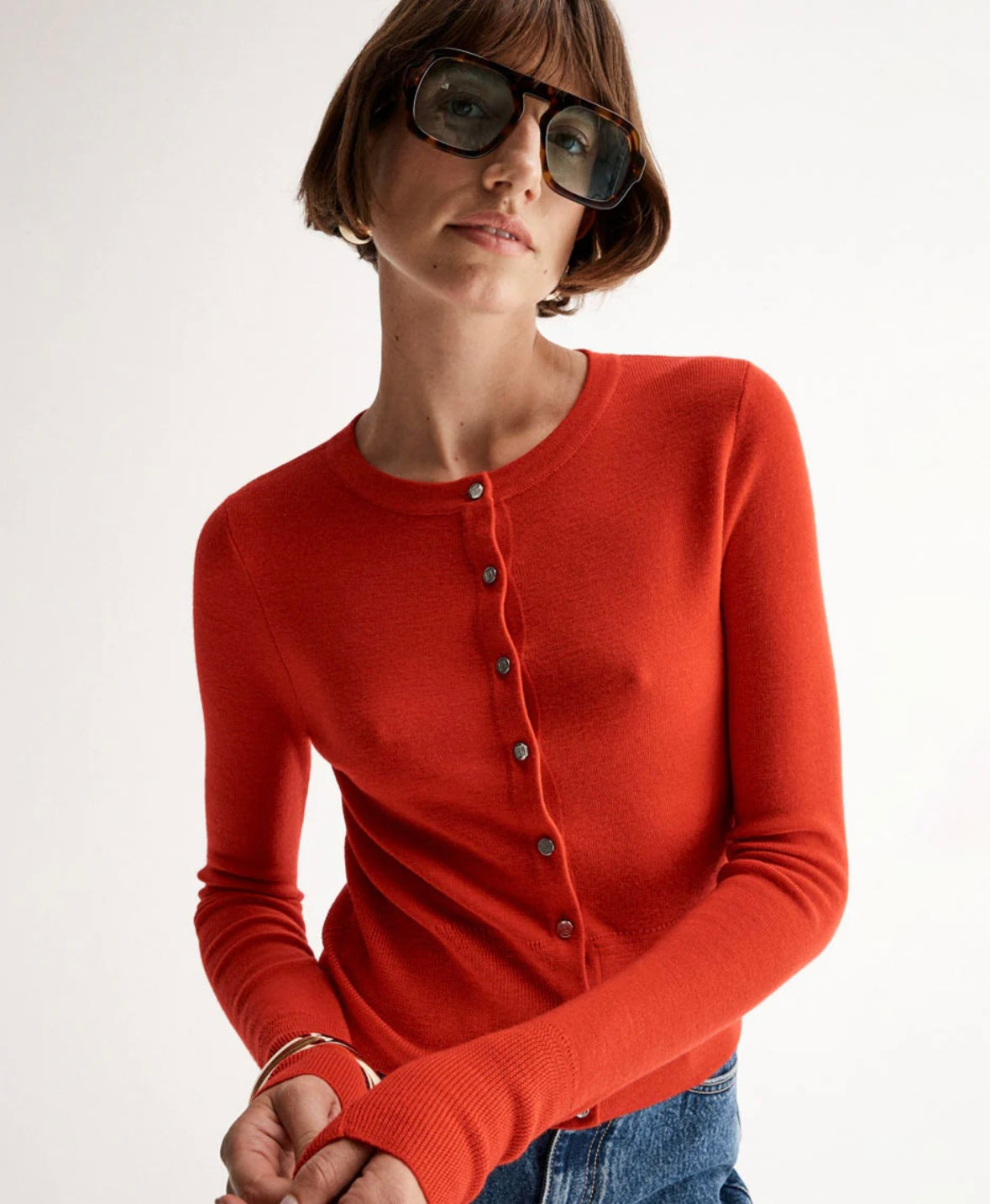 Red cardigan with metal buttons Elka Collective at clothlifestyle boutique 