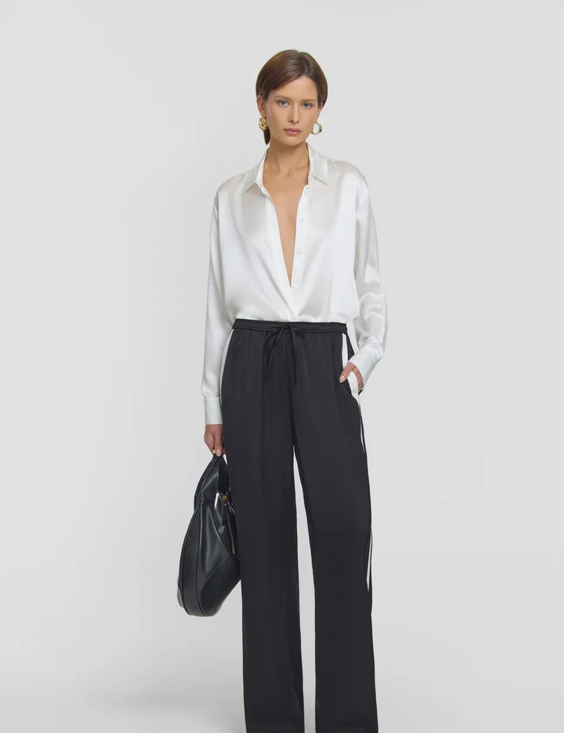 Black pant with white stripe by elka collective at clothlifestyle boutique 