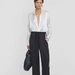 Black pant with white stripe by elka collective at clothlifestyle boutique 