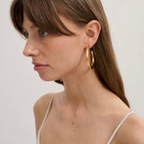 Big hoop gold plated earrings