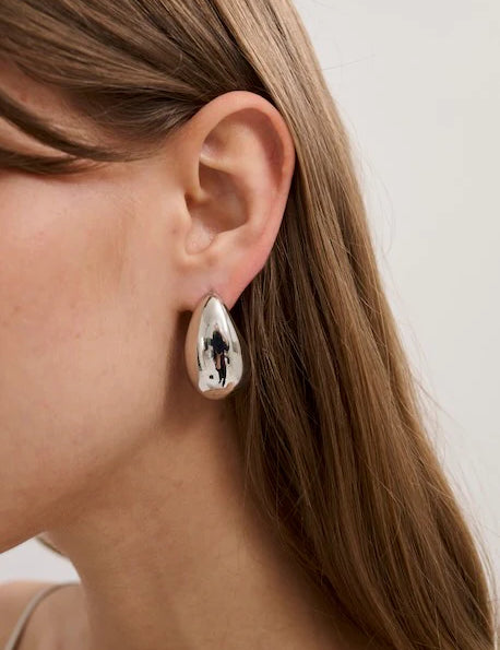 tear drop earring in gun