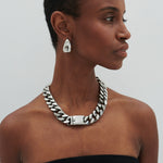tear drop earring in gun