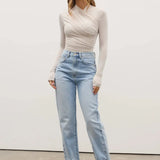 Amrita Bodysuit in Baby