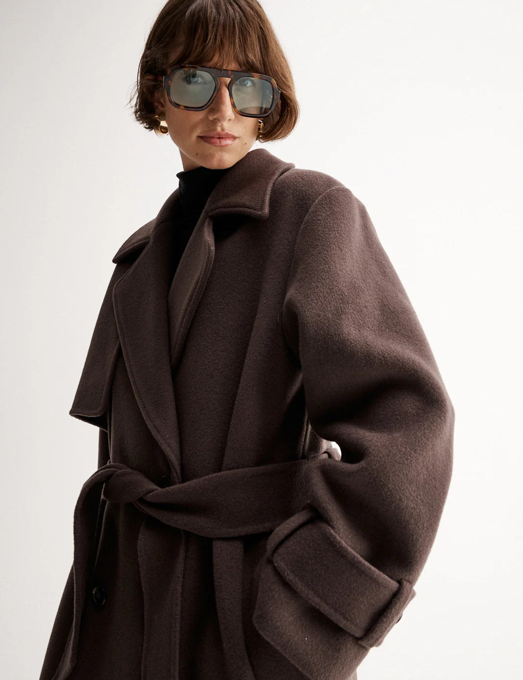 Brown wool coat by Elka Collective at cloth lifestyle 