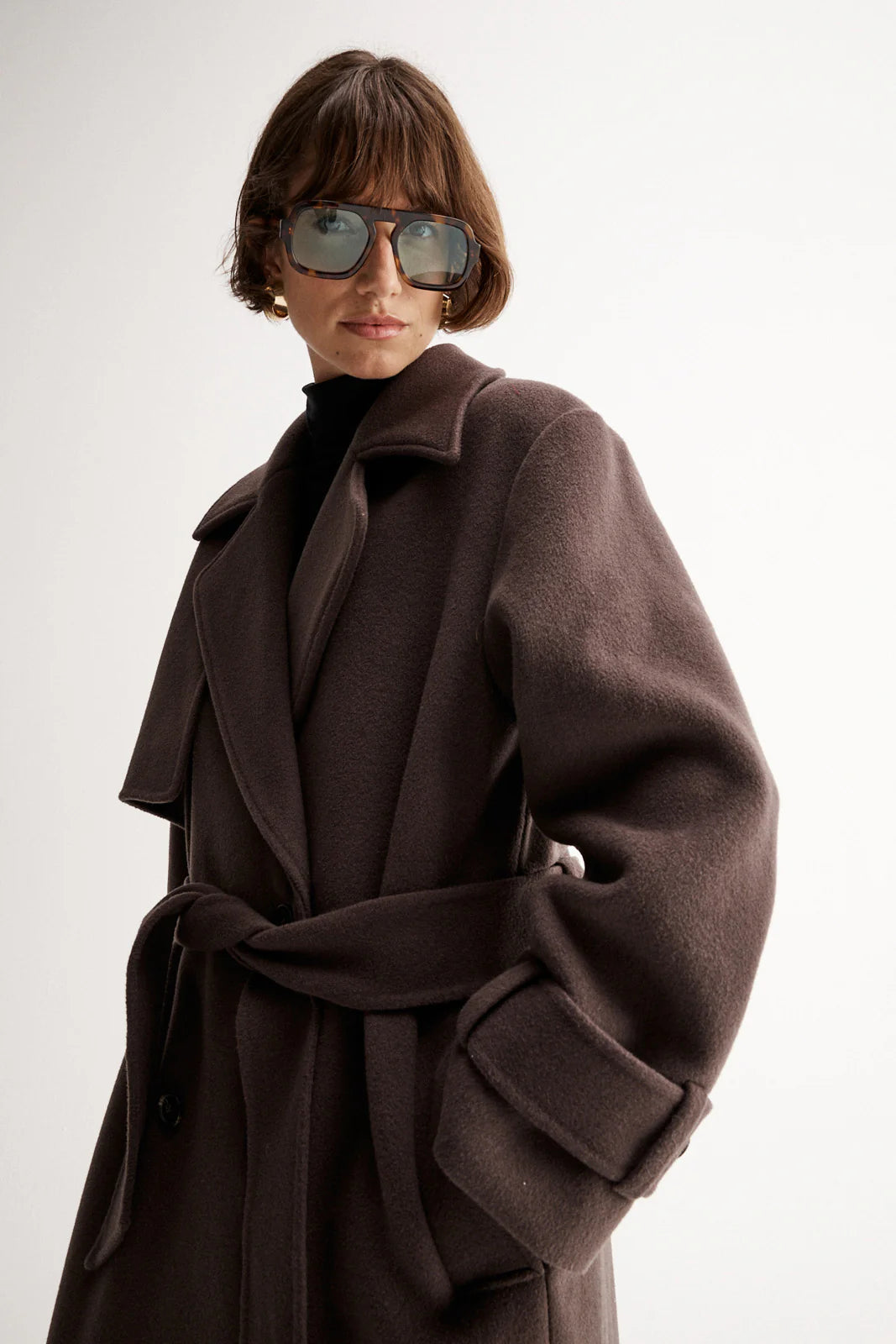 Brown wool coat by Elka Collective at cloth lifestyle 