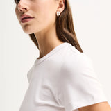 Elka Collective Bonnie Tee in white, featuring a fitted silhouette, classic bound neckline and soft lyocell-blend fabric.