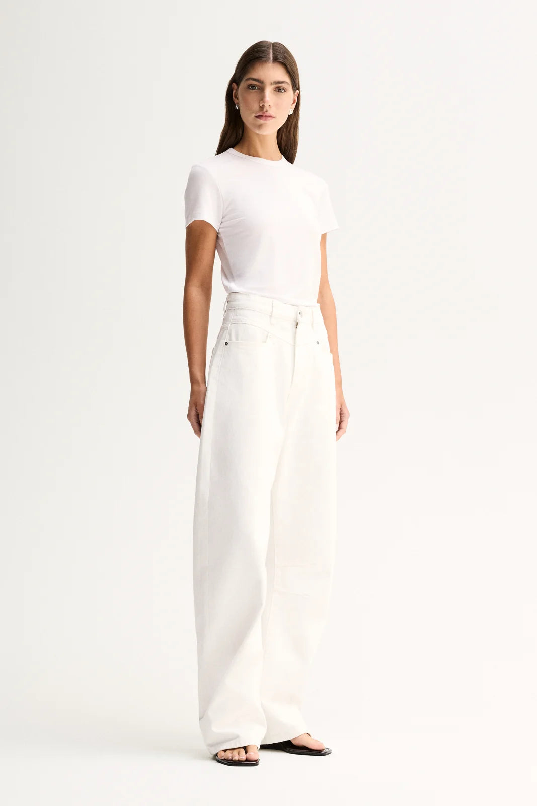 Elka Collective Bonnie Tee in white, featuring a fitted silhouette, classic bound neckline and soft lyocell-blend fabric.