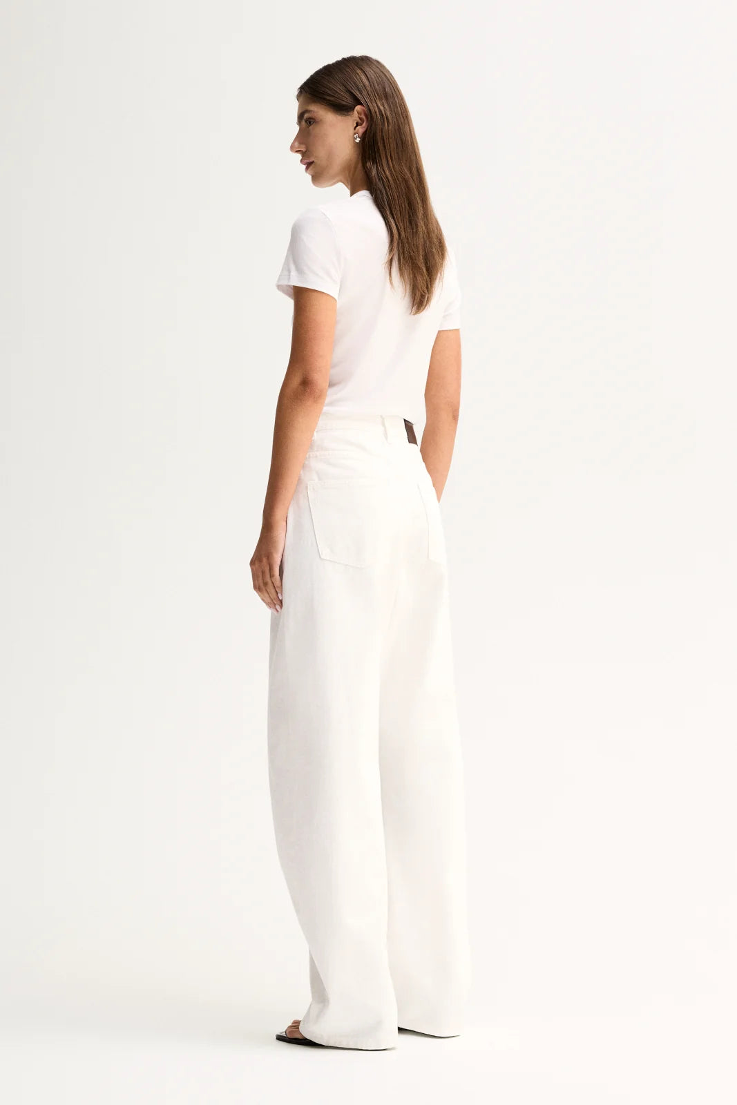 Elka Collective Bonnie Tee in white, featuring a fitted silhouette, classic bound neckline and soft lyocell-blend fabric.